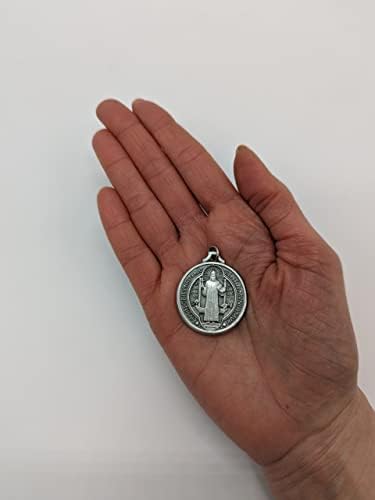 מדליית פרוטגגי של Ovunque של סנט בנדיקט 32 ממ במתכת כסף עם הסבר. מדליית סנט בנדיקט.